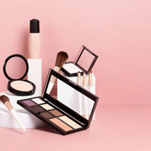 Make up products prsented on white podiums on pink pastel background. Mockup for branding and packaging presentation